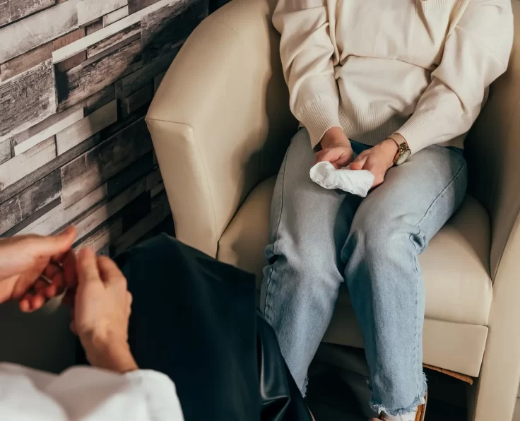 Psychologist counseling patient. Doctor in consultation with patient